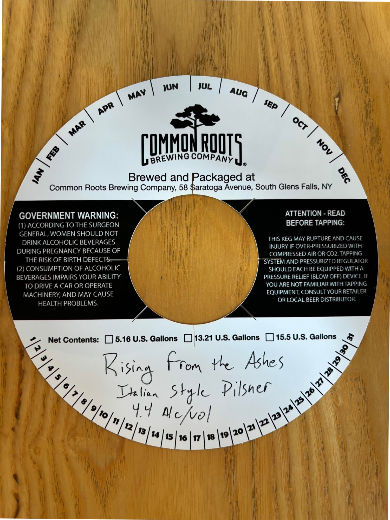Rising From the Ashes by Common Roots Brewing Company - beer label